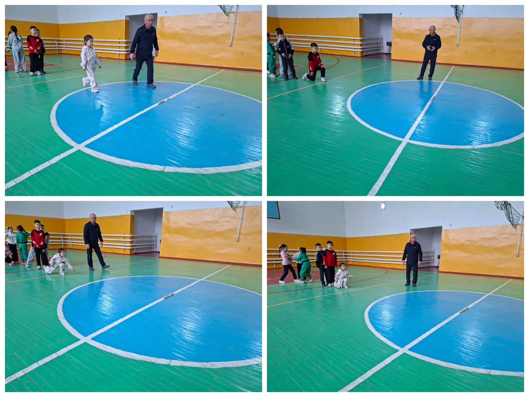 «Асық ату» ұлттық ойынын ойнауда.